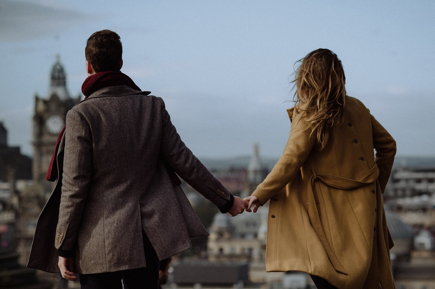 Couple photography with Edinburgh in the background.