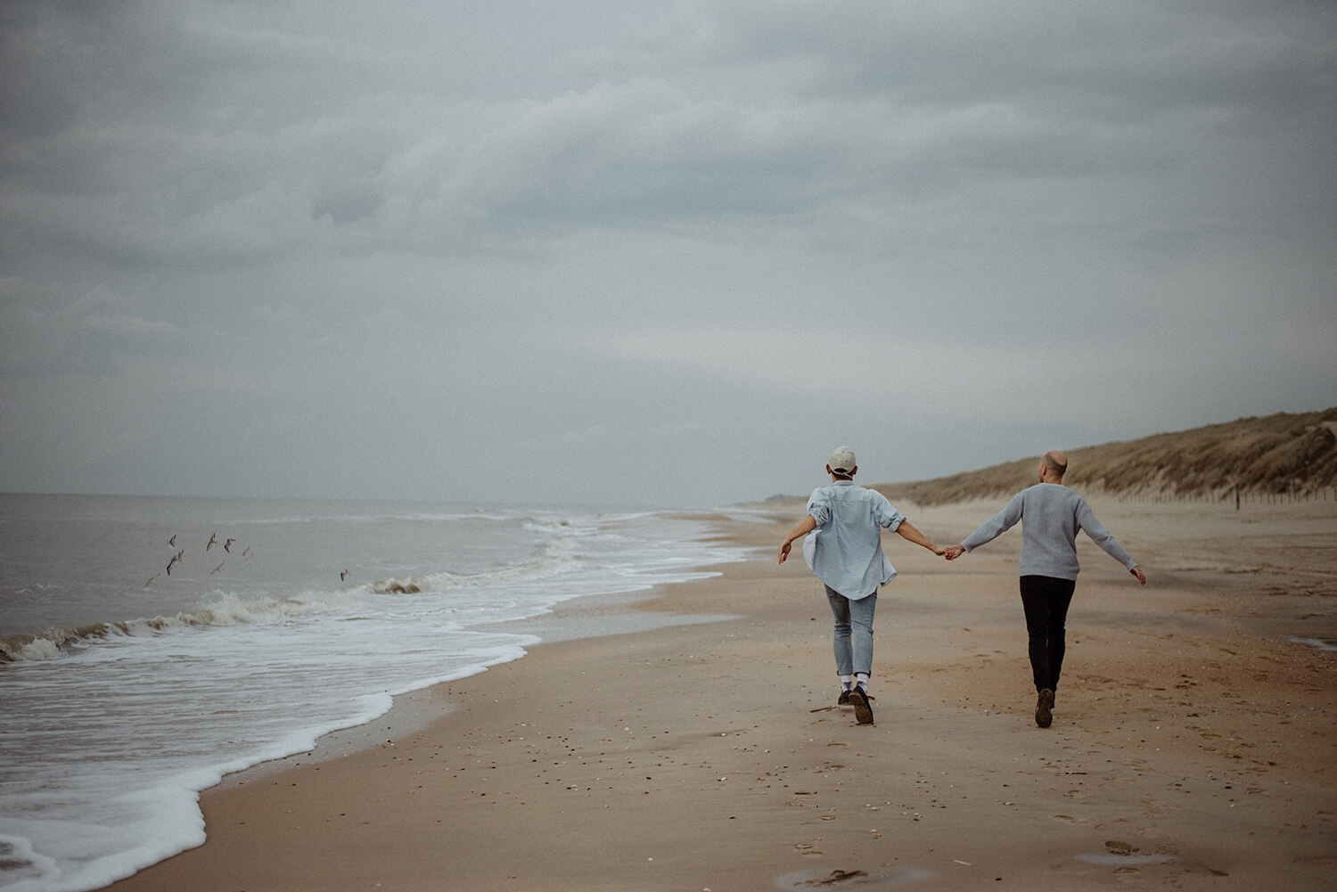 Couple at the seaside in The Netherlands