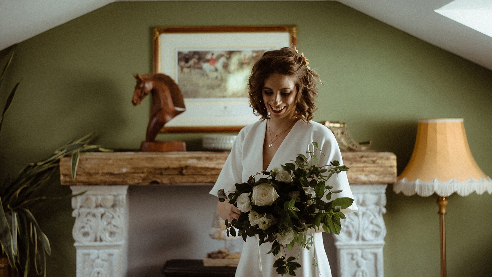 bride and her boquet at a castle